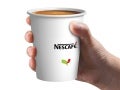 Nescafe coffee cup in hand