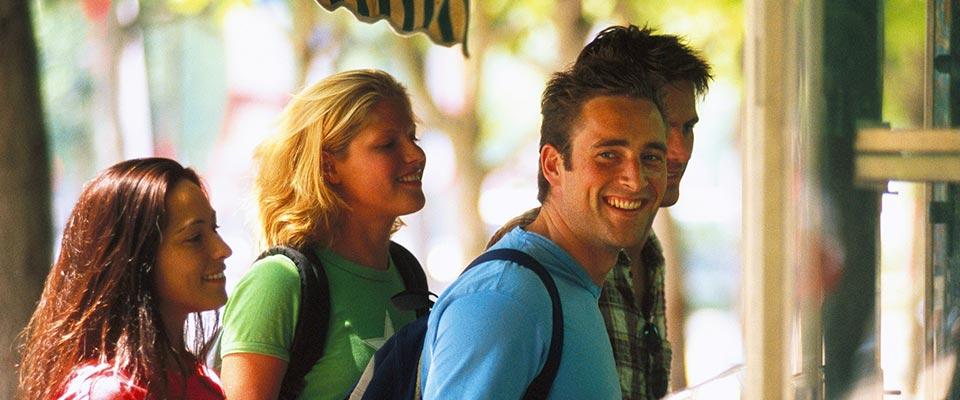 Customers entering a cafe