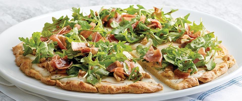 Plate of Pear, Prosciutto and Arugula Pizza featuring Stouffer’s Gluten Free products