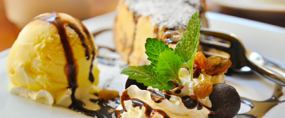 Elegant presentation of cheesecake with ice cream