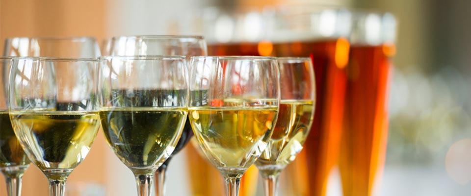 Glasses of white wine and craft beer