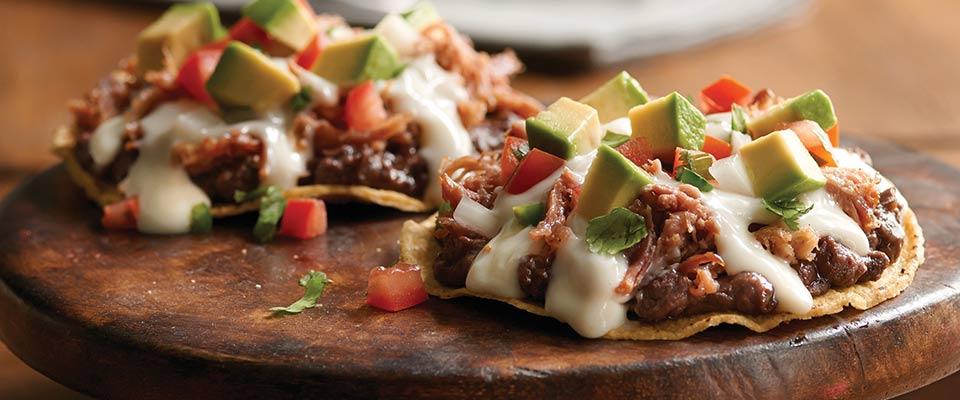 Mexican tostadas served on wood