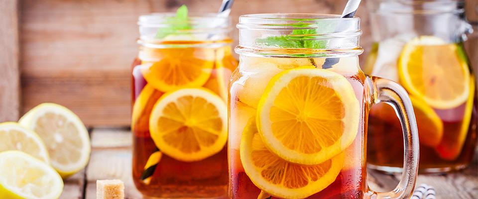 Jars of berry-infused iced tea