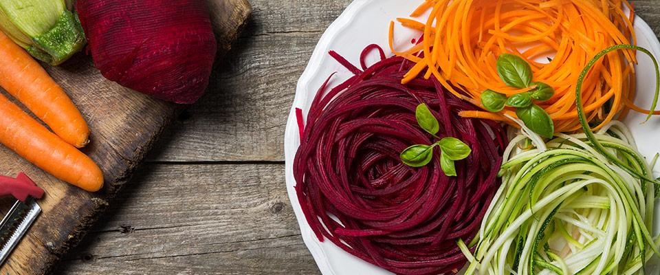 Plate of spiralized vegetables made from carrot, zucchini, and beetroot