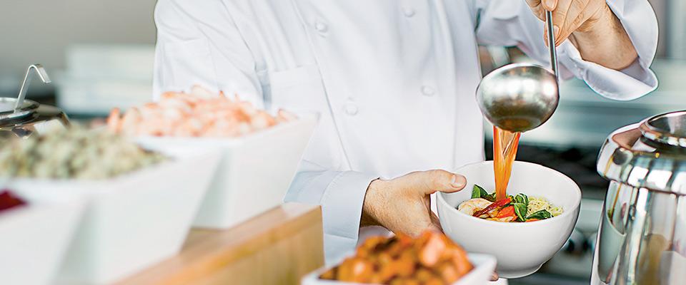 Ladling soup at action station