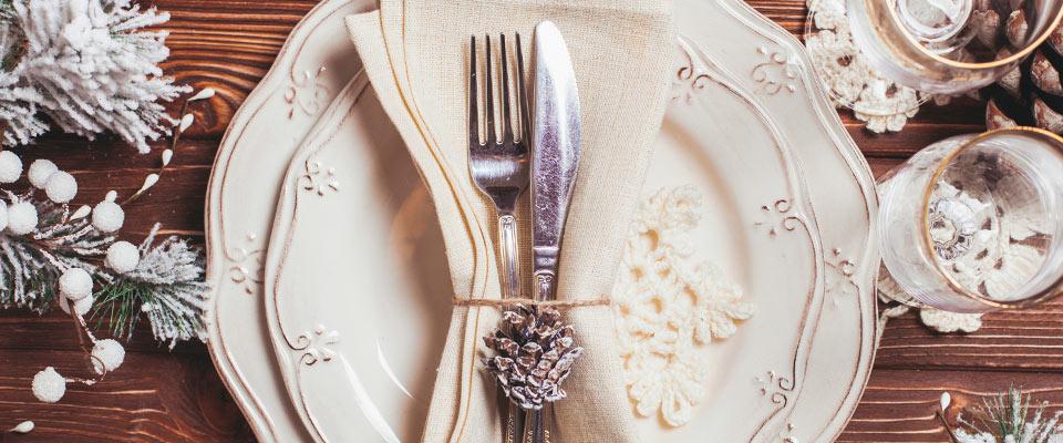 Holiday plate setting on wooden tabletop