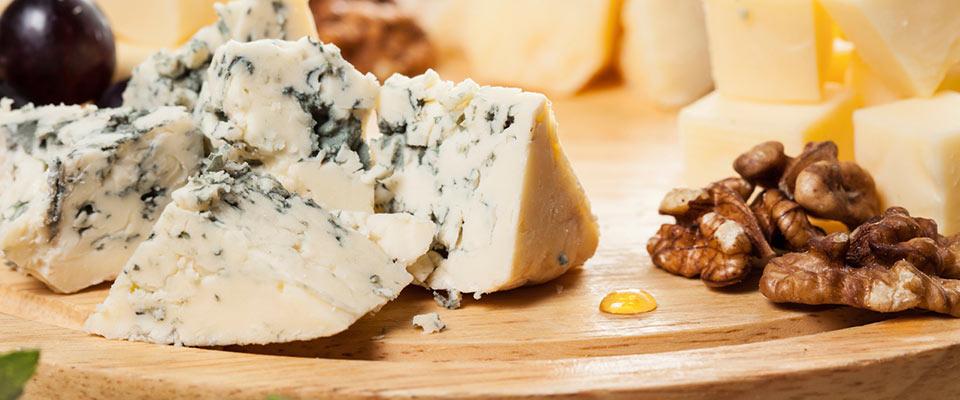 Shareable cheese plate with fruits and nuts