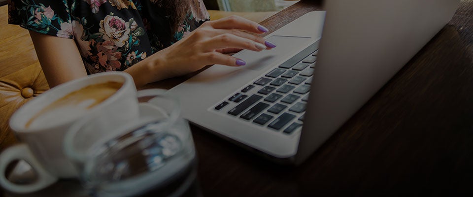 drinking coffee while on the computer