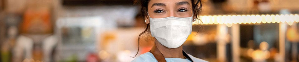 server wearing a mask