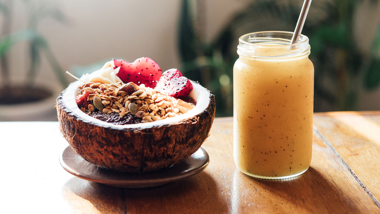 Coconut fruit bowl with beverage