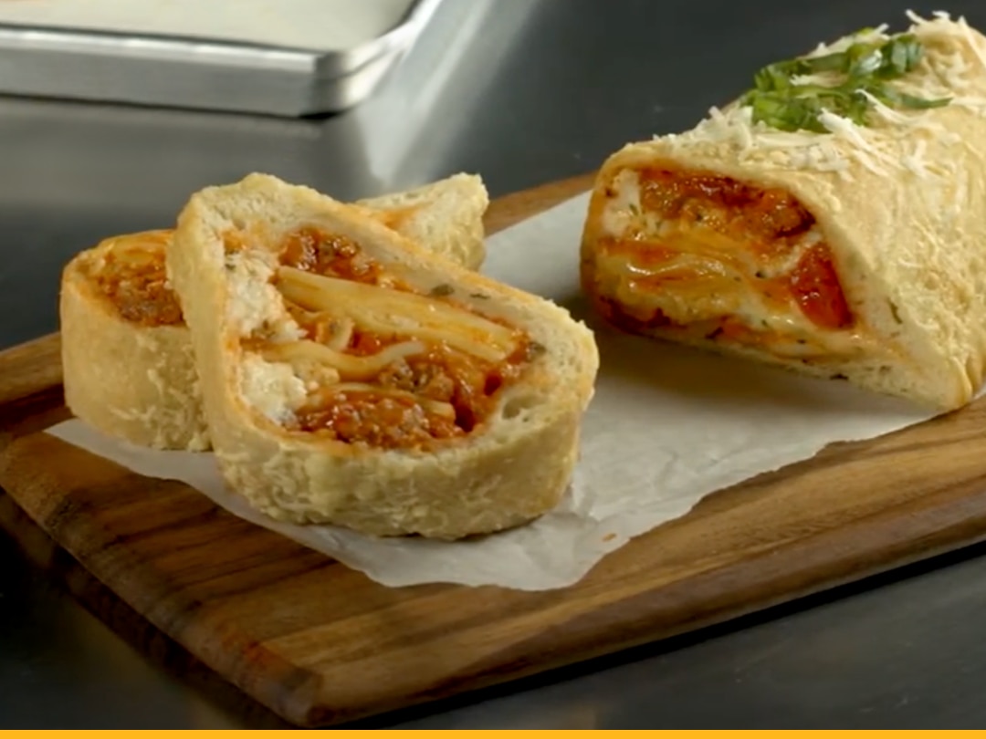 Lasagna Stromboli on a Cutting Board