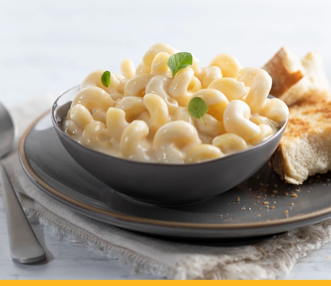 Stouffer's White Cheddar Macaroni and Cheese in a bowl on a plate
