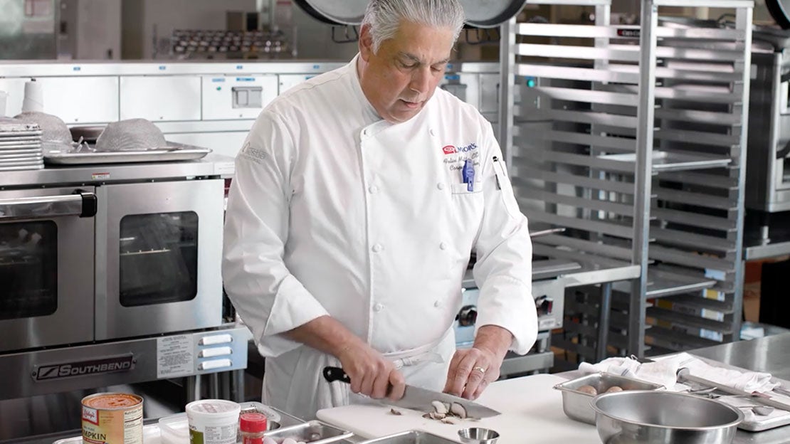 Chef cutting vegetables