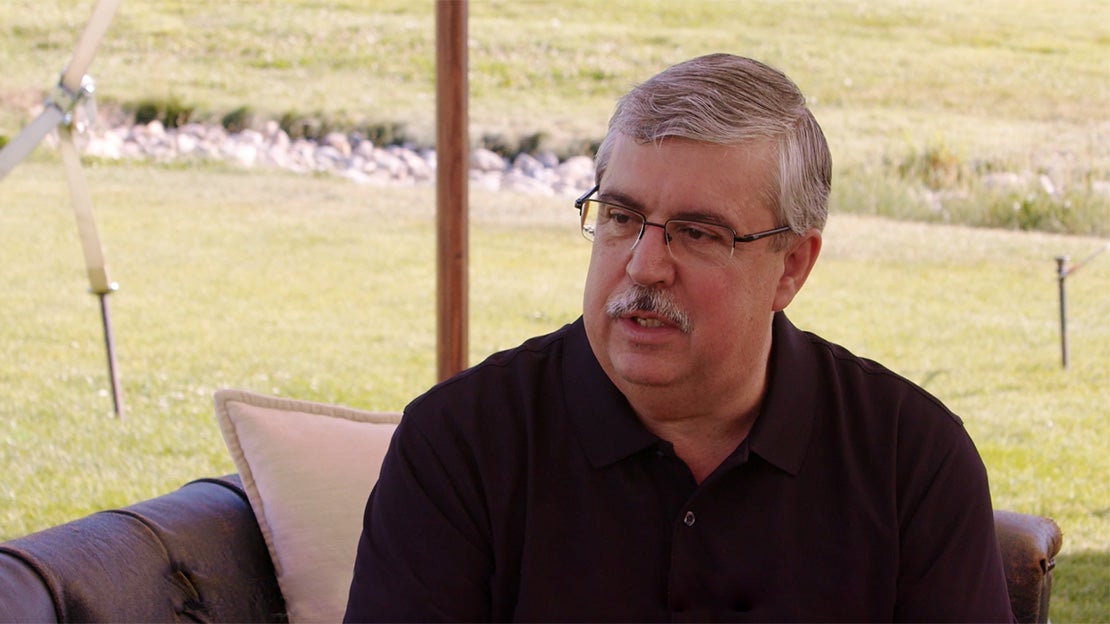 Perry talking at event