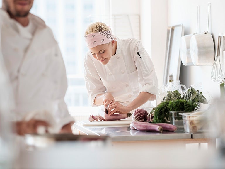 Chef working in kitchen menu development