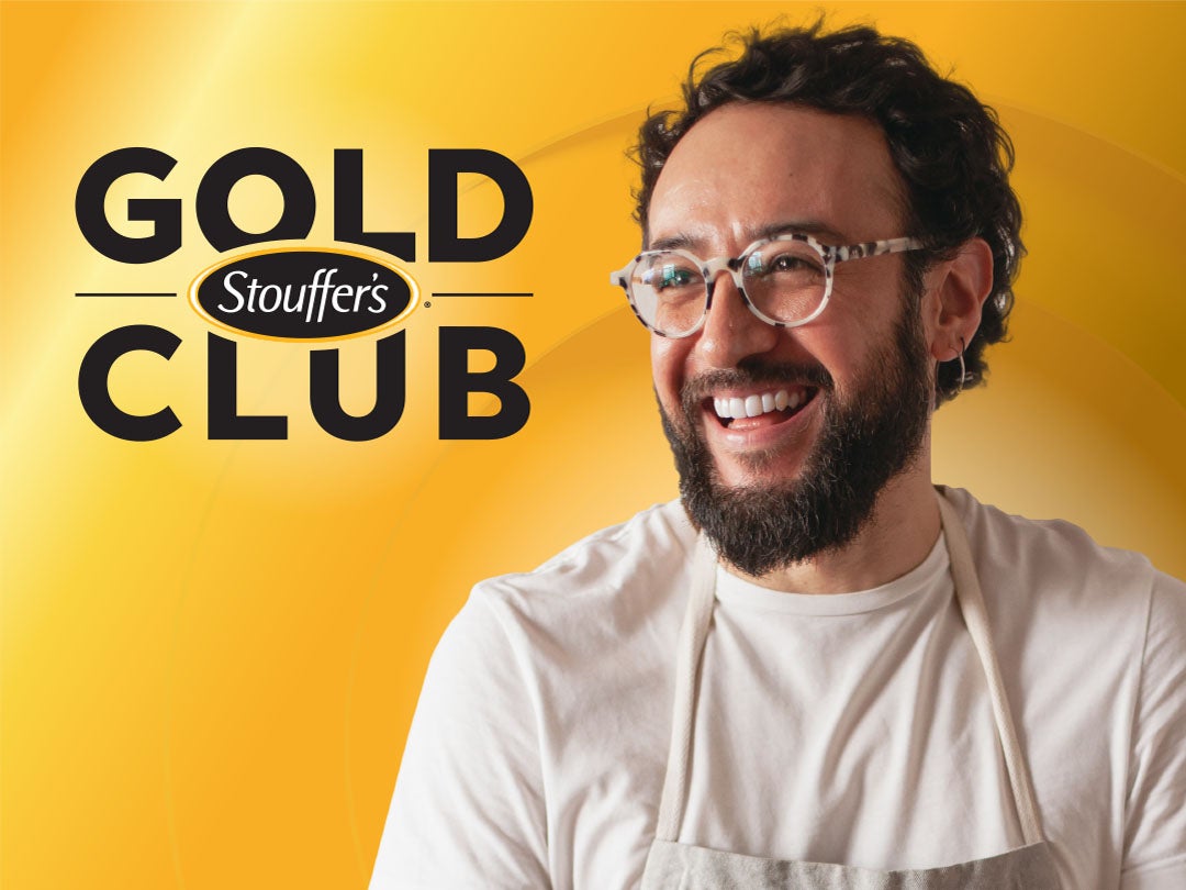 Stouffer's Gold Club man with glasses smiling.
