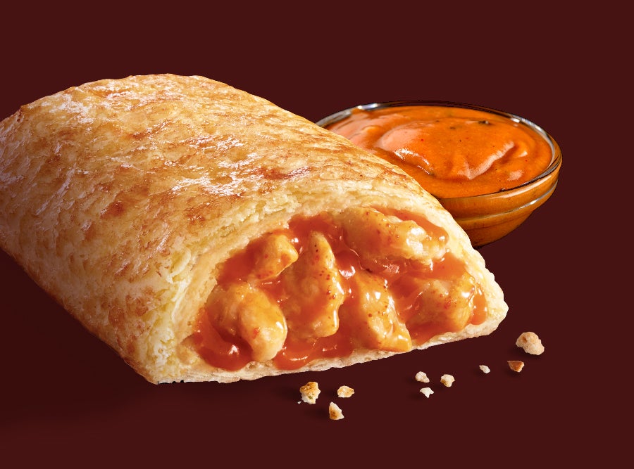 A delicious Hot Pockets Buffalo-Style Chicken sandwich drizzled with savory buffalo sauce