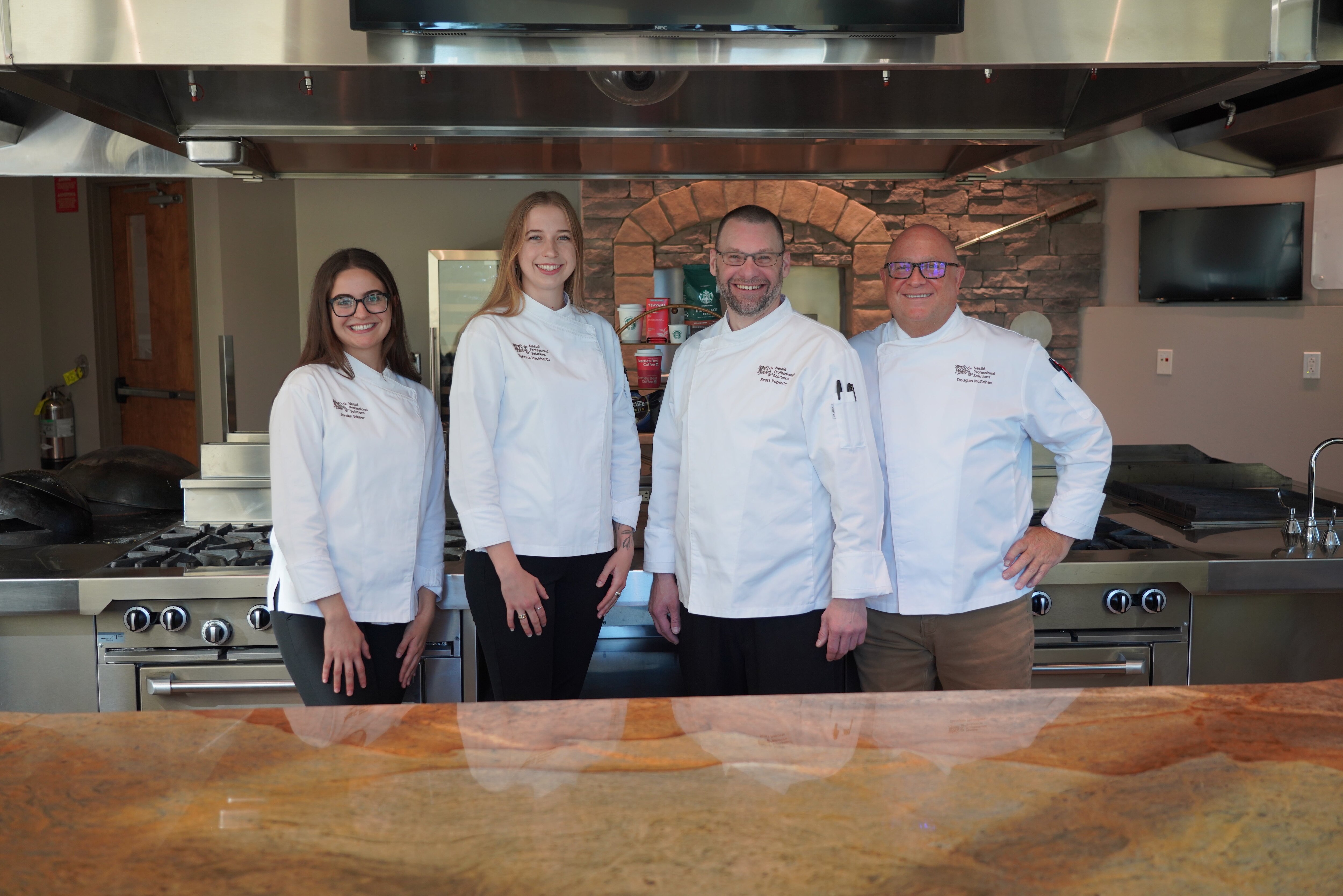 group image of chefs in kitchen