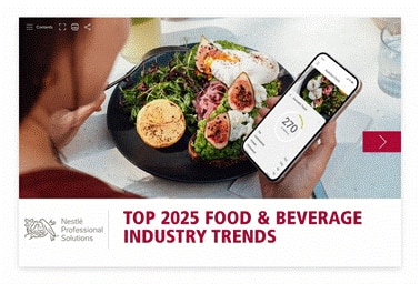 2025 Trend Report cover image person holding cell phone while eating