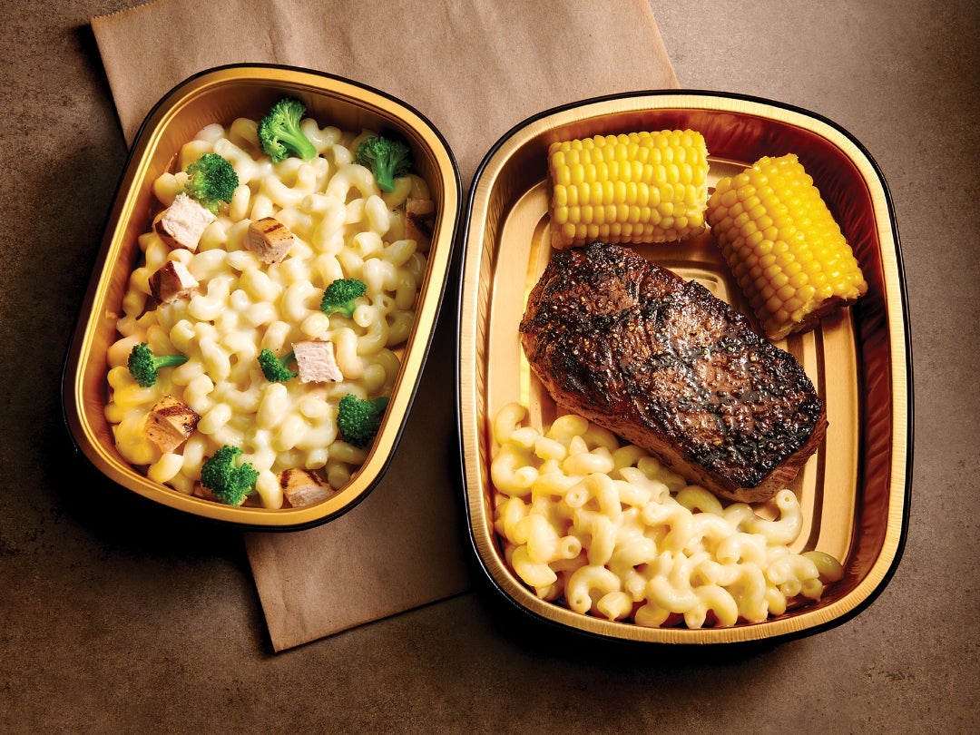 two Strouffers entrees with salsbury steak and corn