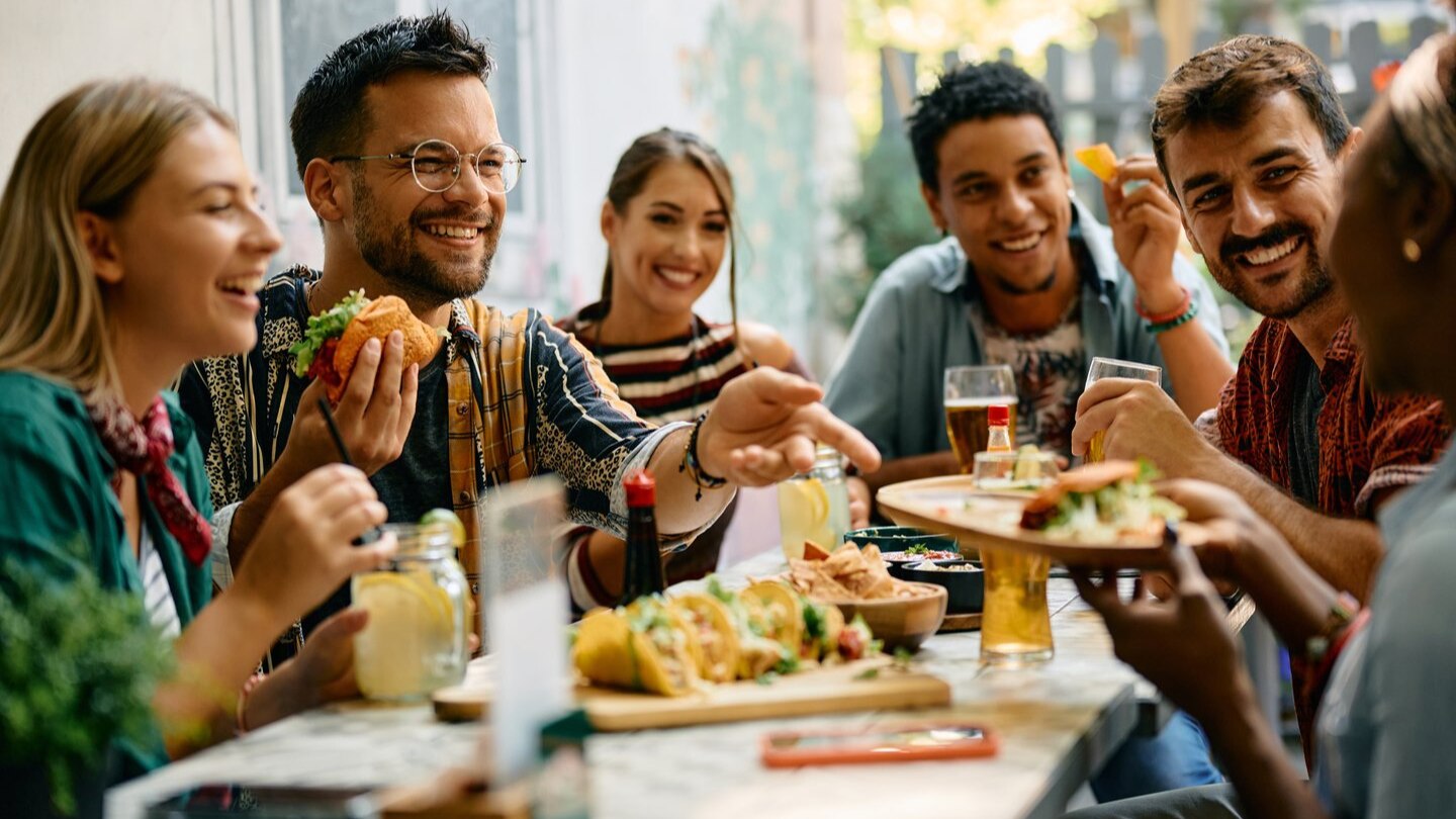 group of people eating at a table