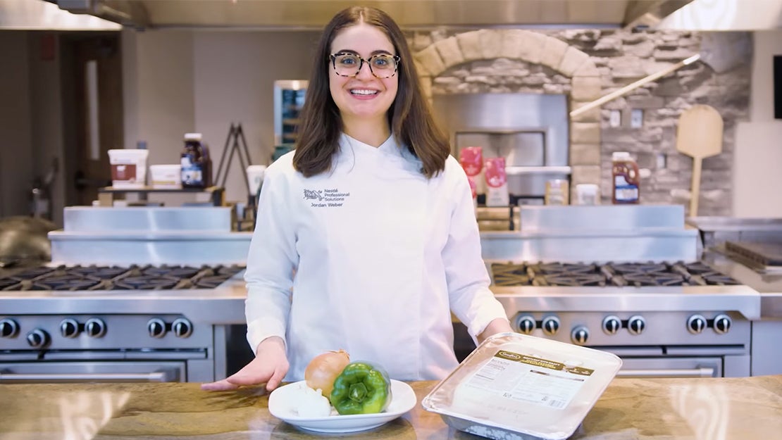 Chef with onion garlic and green pepper meatloaf with gravy