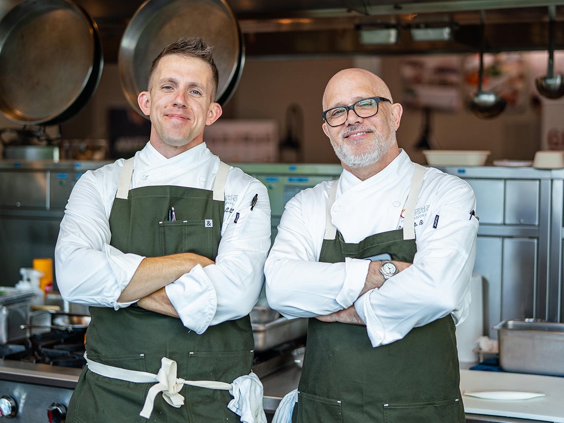 Two chefs in aprons
