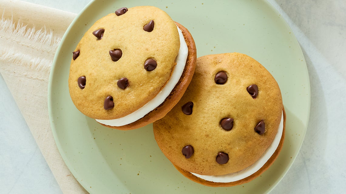 Two semi-sweet morsels cookie sandwiches with whipped cream filling