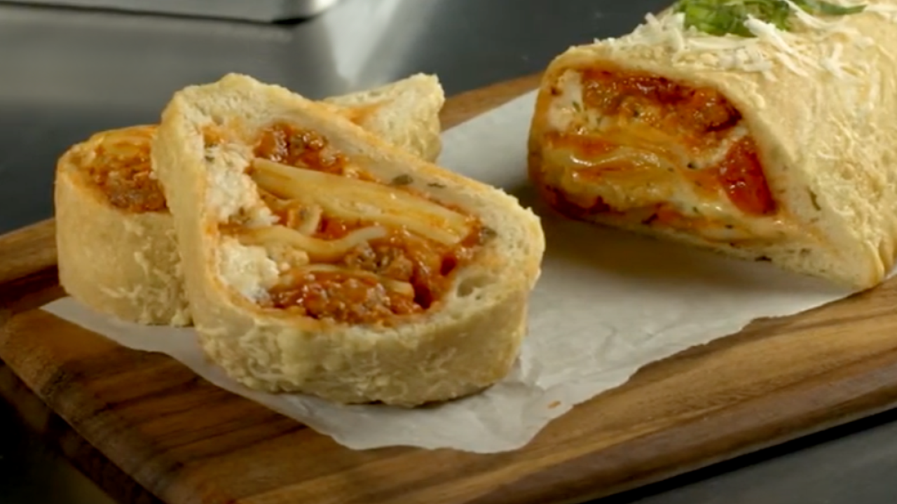 Lasagna Stromboli on a Cutting Board