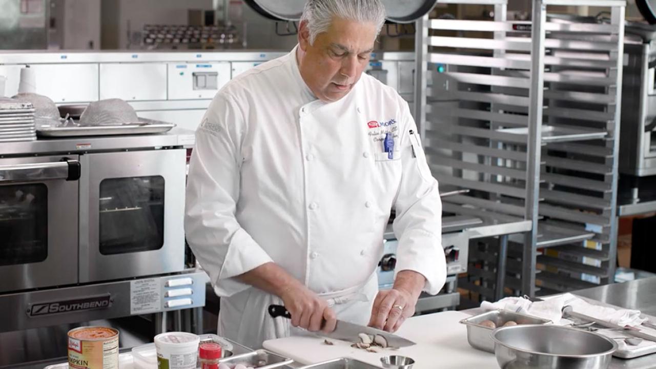 Chef cutting vegetables