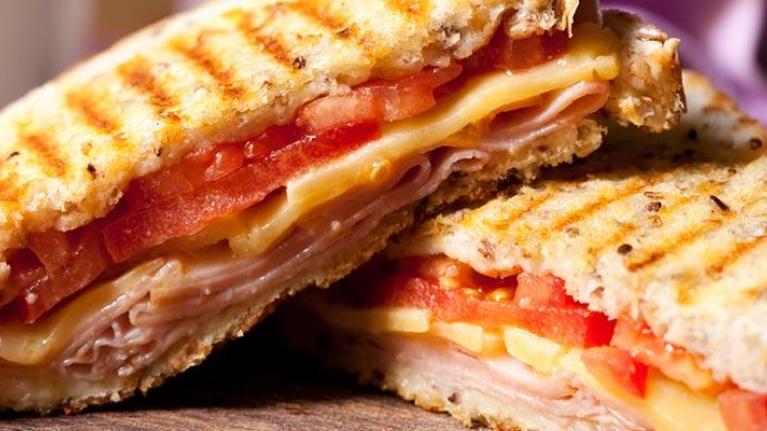 Grilled ham and melted cheese sandwich