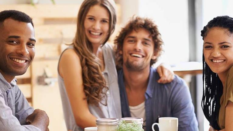 Group of millennials with beverages at cafe and restaurant