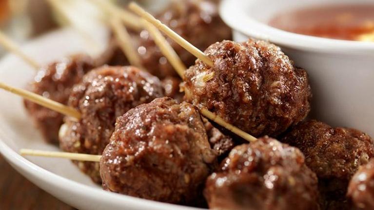 Plate with meatballs on toothpicks