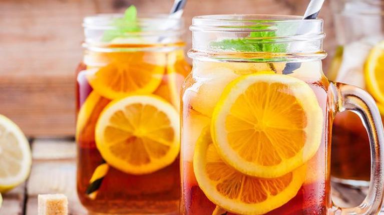 Jars of berry-infused iced tea