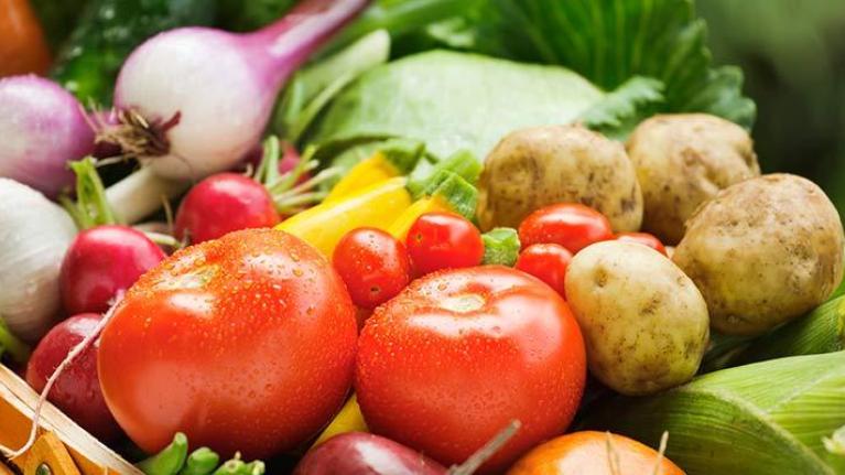 Basket of fresh vegetables in season