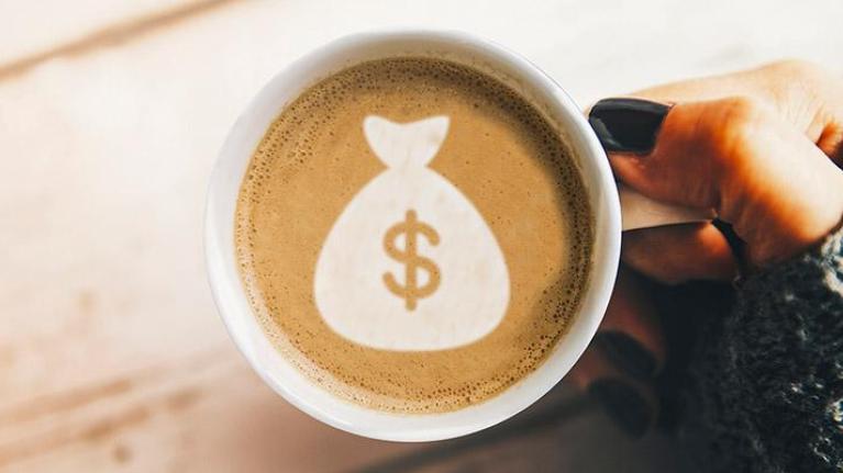 Cold-weather coffee drink with promotional foam graphic