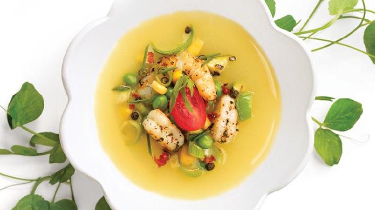 Bowl of chicken soup with vegetables