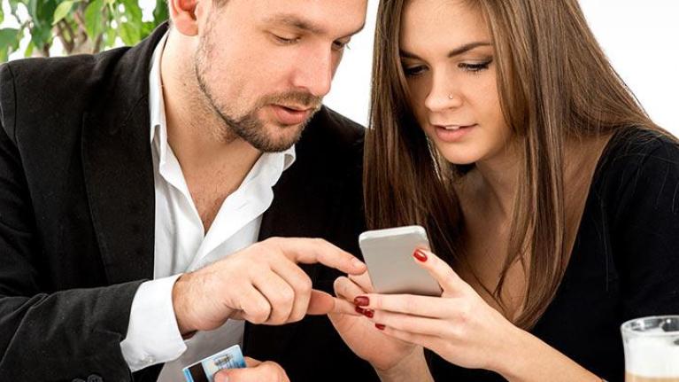 Couple reviewing the bill in a restaurant