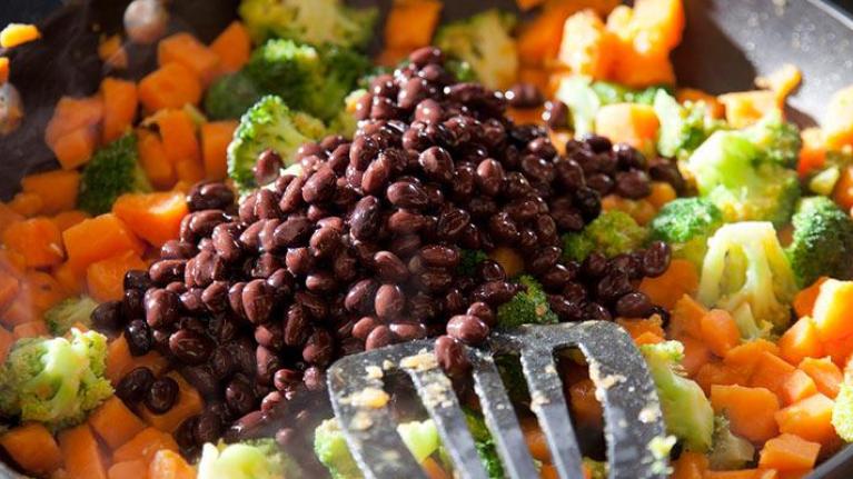 Pan of black beans, sweet potatoes, and broccoli