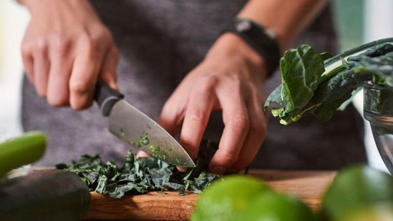 Person chopping vegetables