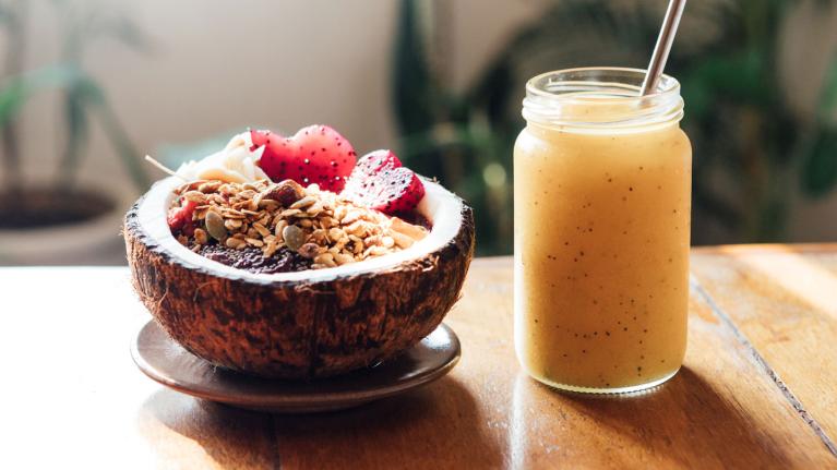 Coconut fruit bowl with beverage