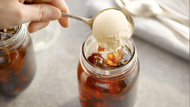 Iced coffee with ice cream scoop on top