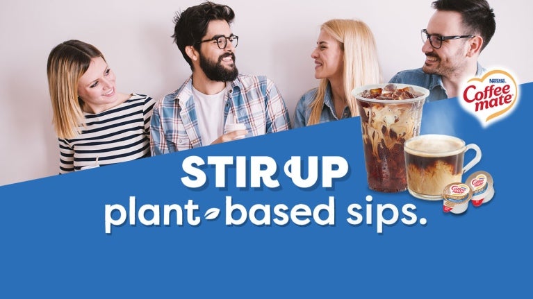 Two men and two women smiling and looking at each other. Test says "Stir up plant-based sips."