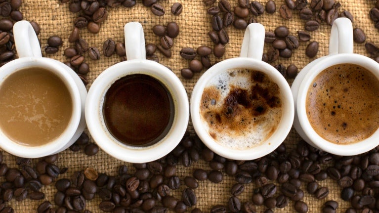 Overhead of coffee in cups