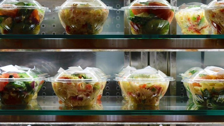 Prepackaged salads on shelf