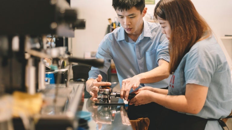 Man and Woman baristas