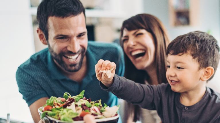 Man Woman and Child Eating Healthy Food Together