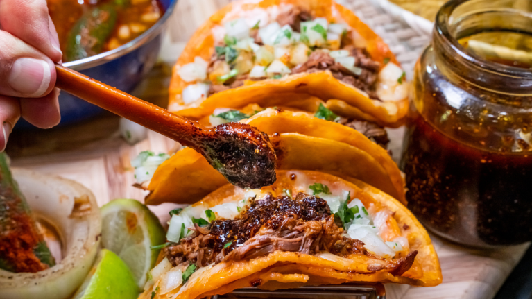 Tacos being filled