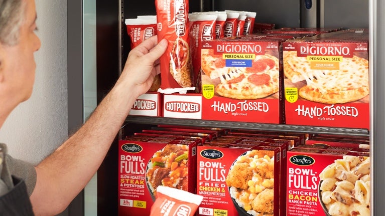 man reaching for hot pocket grab and go