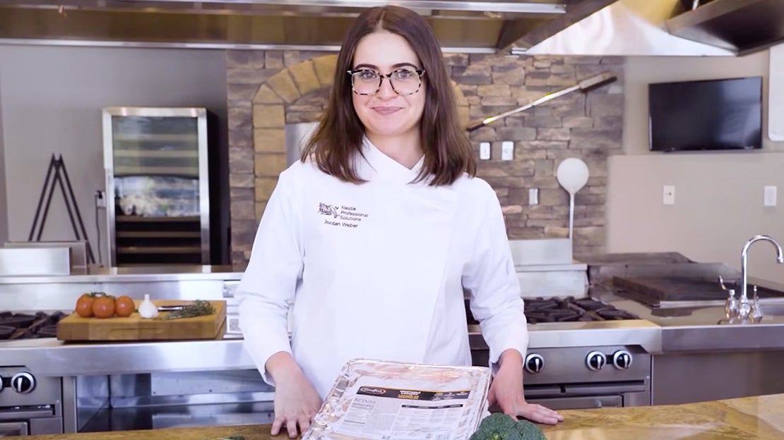 Chef with tray of Stouffer's Vegetable Lasagna